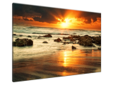 Fotoobraz na stenu Východ slnka nad rozbúreným oceánom