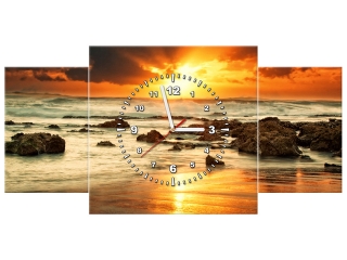 Obraz s hodinami Východ slnka nad rozbúreným oceánom