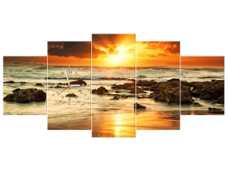 Obraz s hodinami Východ slnka nad rozbúreným oceánom