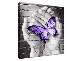 Obraz Motýľ na dlaniach