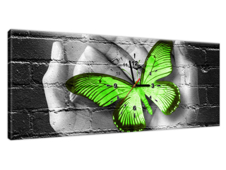 Obraz s hodinami na plátne Zelený motýľ v dlaniach