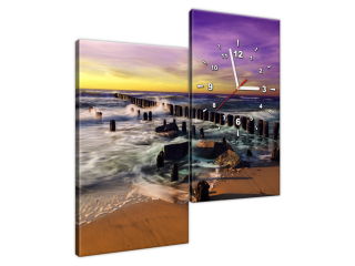 Obraz s hodinami Západ slnka nad morskou plážou s fialovou oblohou