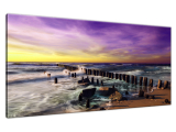 Obraz Západ slnka nad morskou plážou s fialovým nebom