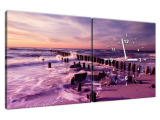 Západ slnka nad morskou plážou vo fialovej Obraz s hodinami